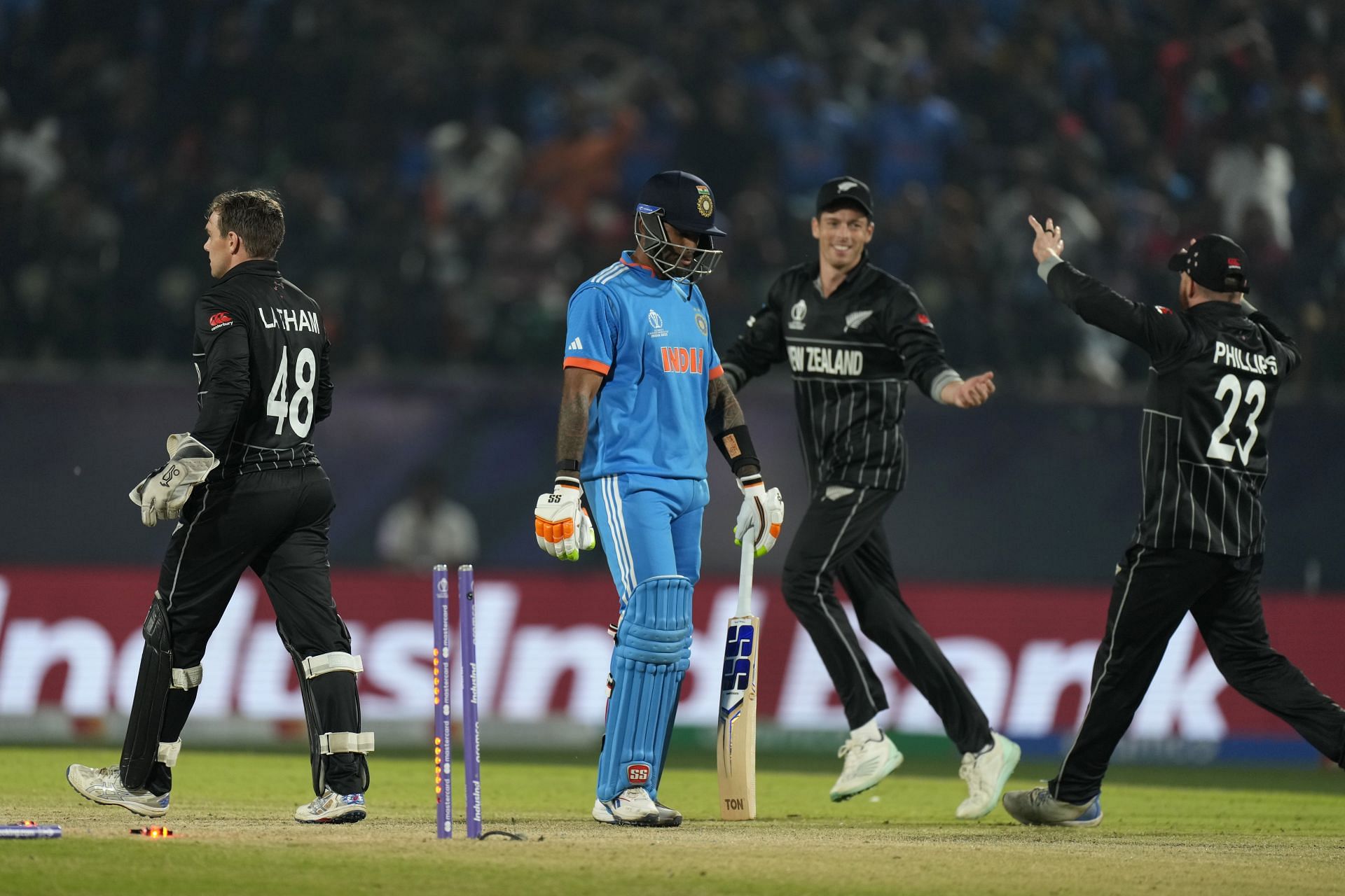 New Zealand players celebrate the wicket of India's Suryakumar Yadav. (Pic: AP)